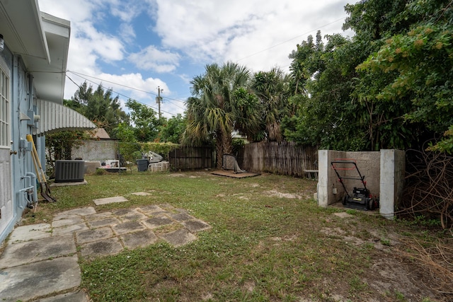 1214 Peak Rd, Lantana, FL 33462 - view of yard featuring central AC unit