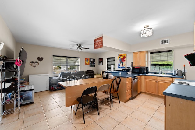 1214 Peak Rd, Lantana, FL 33462 - kitchen with a sink, light brown cabinets, refrigerator, ceiling fan, and black microwave