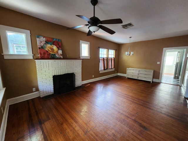 1512 Florida Ave Unit A/B, West Palm Beach, FL 33401 - unfurnished living room with wood finished floors, a ceiling fan, baseboards, and a fireplace