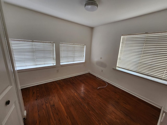 1512 Florida Ave Unit A/B, West Palm Beach, FL 33401 - spare room featuring baseboards and wood finished floors