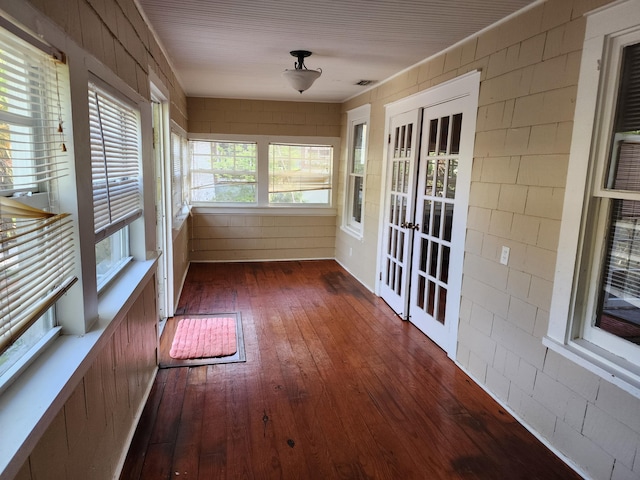 1512 Florida Ave Unit A/B, West Palm Beach, FL 33401 - unfurnished sunroom featuring french doors and hardwood / wood-style flooring