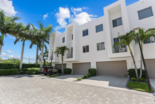 4021 NW 18th Way, Boca Raton, FL 33431 - view of property with a garage and driveway
