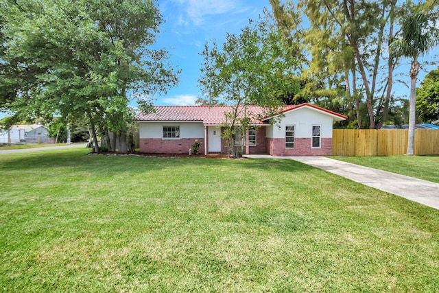 1103 NW 7th Ct, Boynton Beach, FL 33426 - ranch-style home with brick siding, a tile roof, concrete driveway, and stucco siding