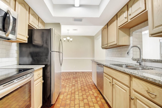 1103 NW 7th Ct, Boynton Beach, FL 33426 - kitchen featuring stainless steel appliances, a sink, brick patterned flooring, and tasteful backsplash