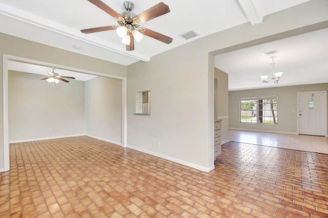 1103 NW 7th Ct, Boynton Beach, FL 33426 - unfurnished room featuring brick floors, a chandelier, a ceiling fan, and baseboards