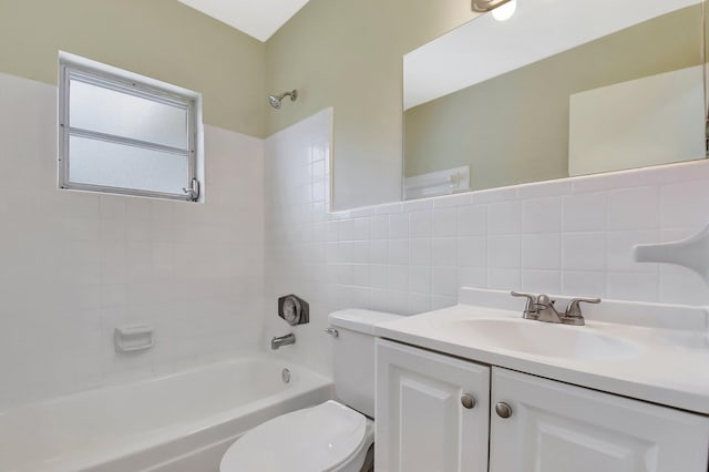 1103 NW 7th Ct, Boynton Beach, FL 33426 - full bathroom with toilet, vanity, tile walls, bathtub / shower combination, and tasteful backsplash