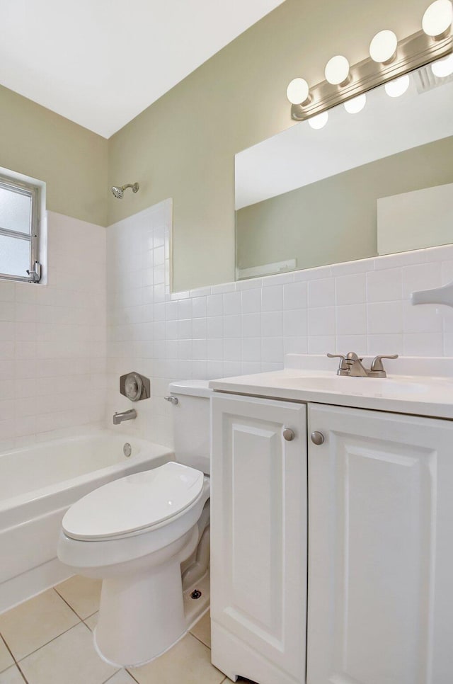 1103 NW 7th Ct, Boynton Beach, FL 33426 - bathroom with tile walls, toilet, shower / bath combination, tile patterned flooring, and vanity