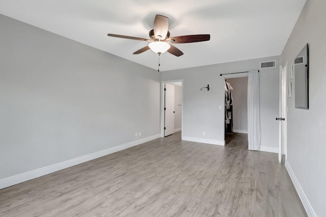 3118 Florida Blvd Unit 204-B, Delray Beach, FL 33483 - unfurnished room with a ceiling fan, wood finished floors, and baseboards