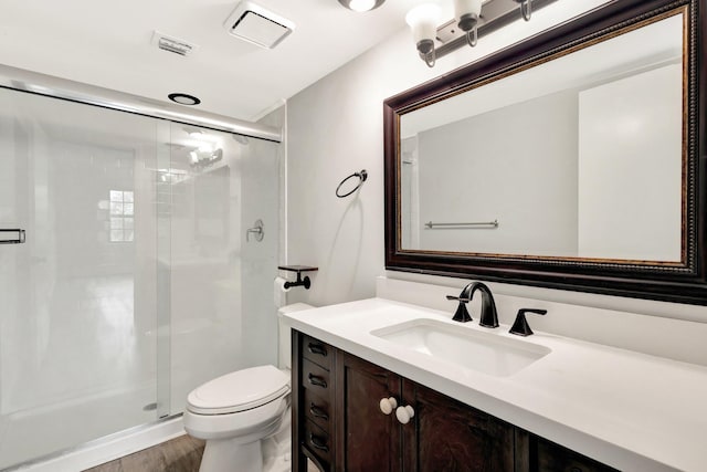3118 Florida Blvd Unit 204-B, Delray Beach, FL 33483 - bathroom featuring vanity, a shower stall, toilet, and wood finished floors