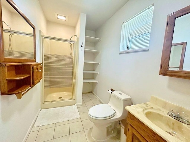 2657 River Rd, Moore Haven, FL 33471 - bathroom featuring tile patterned floors, vanity, a stall shower, toilet, and baseboards