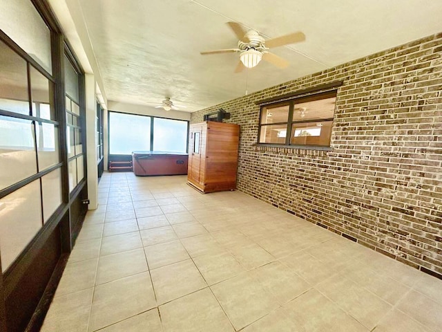 2657 River Rd, Moore Haven, FL 33471 - unfurnished sunroom with a hot tub