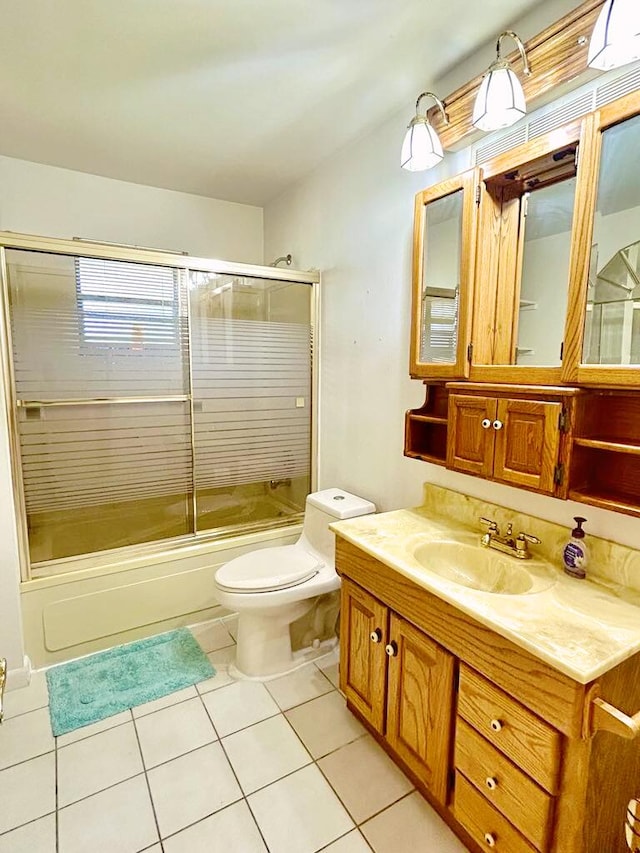 2657 River Rd, Moore Haven, FL 33471 - full bathroom with toilet, vanity, shower / bath combination with glass door, and tile patterned flooring