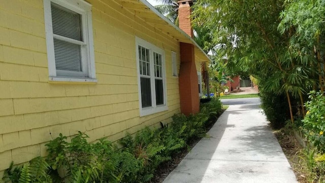 1512 Florida Ave Unit 1/2, West Palm Beach, FL 33401 - view of home's exterior featuring a chimney