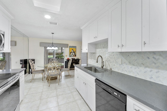 14444 Campanelli Dr, Delray Beach, FL 33484 - kitchen featuring stainless steel appliances, a sink, a textured ceiling, tasteful backsplash, and white cabinets