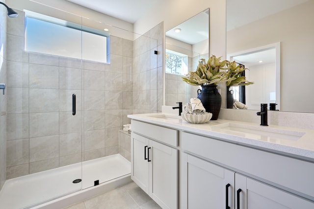 7484 Lenora Ln, Lake Worth, FL 33467 - bathroom featuring double vanity, a shower stall, and tile patterned floors