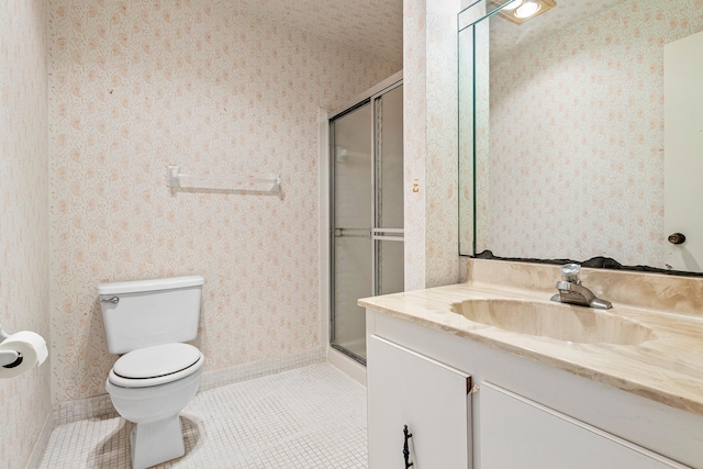 5606 Via Delray Unit B, Delray Beach, FL 33484 - full bath featuring vanity, tile patterned floors, toilet, wallpapered walls, and a shower with door