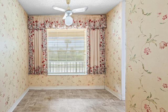 5606 Via Delray Unit B, Delray Beach, FL 33484 - unfurnished dining area with a textured ceiling, baseboards, and a ceiling fan