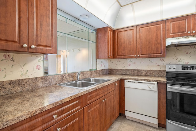 5606 Via Delray Unit B, Delray Beach, FL 33484 - kitchen featuring dishwasher, stainless steel electric stove, under cabinet range hood, a sink, and brown cabinets