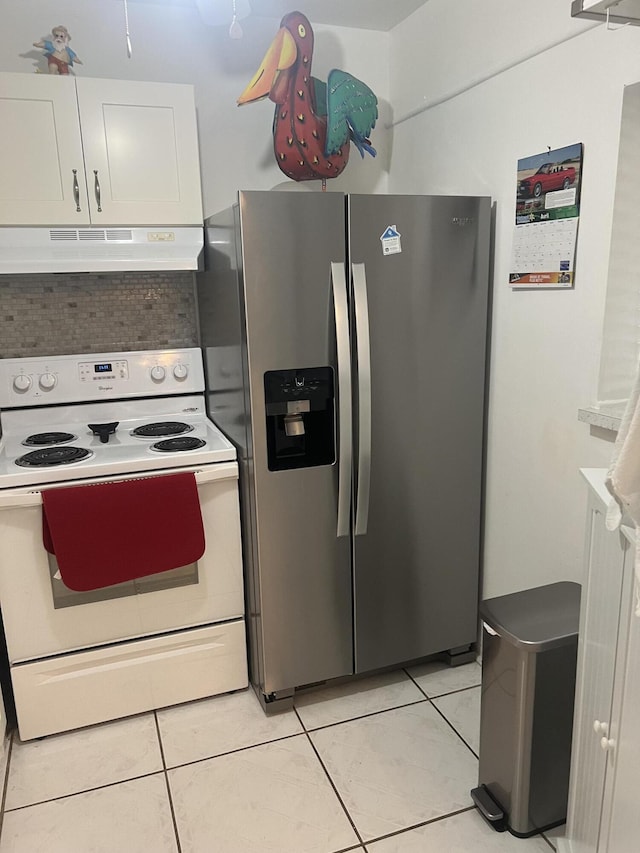 132 Berkshire F, West Palm Beach, FL 33417 - kitchen with electric stove, stainless steel refrigerator with ice dispenser, under cabinet range hood, light tile patterned floors, and backsplash