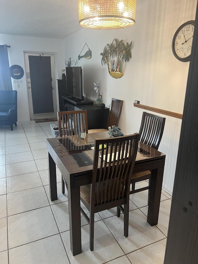 132 Berkshire F, West Palm Beach, FL 33417 - dining space featuring light tile patterned floors