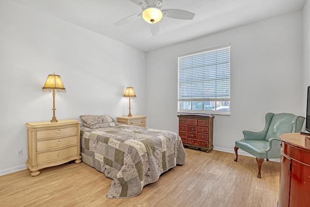 7703 Caprio Dr, Boynton Beach, FL 33472 - bedroom with light wood-type flooring, baseboards, and ceiling fan
