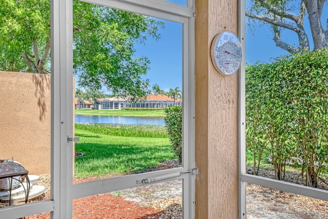 7703 Caprio Dr, Boynton Beach, FL 33472 - doorway to outside featuring a water view