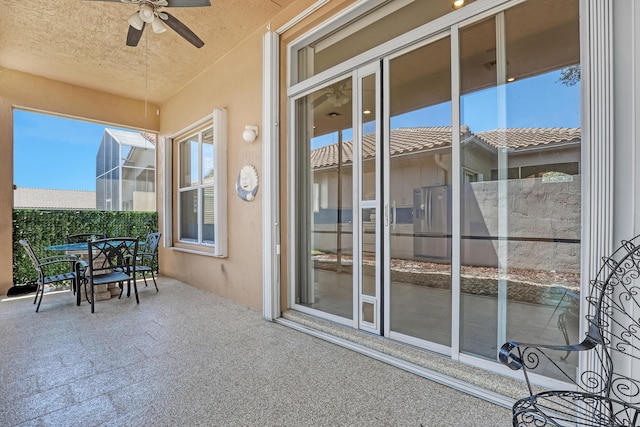 7703 Caprio Dr, Boynton Beach, FL 33472 - view of patio / terrace with a ceiling fan and outdoor dining area