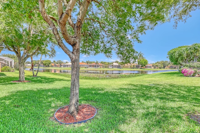 7703 Caprio Dr, Boynton Beach, FL 33472 - view of grassy yard with a water view and a residential view