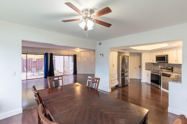 103 Weybridge C Cir Unit C, Royal Palm Beach, FL 33411 - dining area with dark wood-style floors and ceiling fan