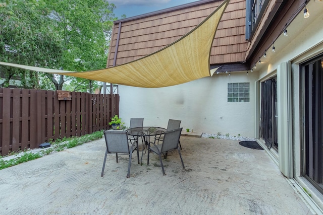 103 Weybridge C Cir Unit C, Royal Palm Beach, FL 33411 - view of patio / terrace featuring outdoor dining space
