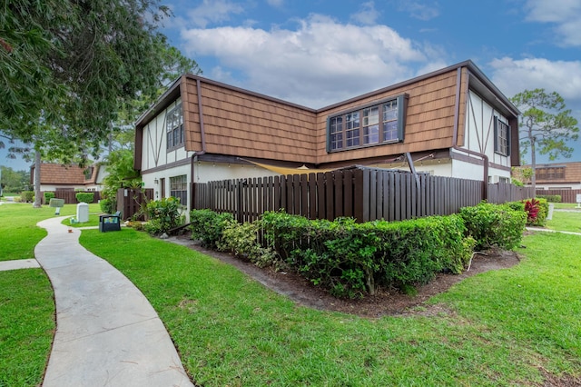 103 Weybridge C Cir Unit C, Royal Palm Beach, FL 33411 - back of property featuring mansard roof and stucco siding