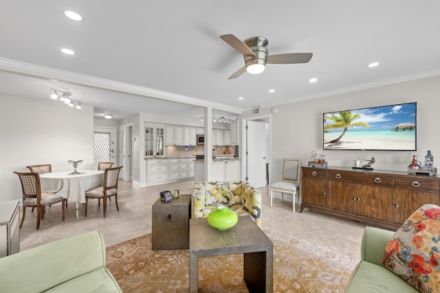 112 Piedmont C, Delray Beach, FL 33484 - living room featuring crown molding, a ceiling fan, recessed lighting, and light tile patterned floors