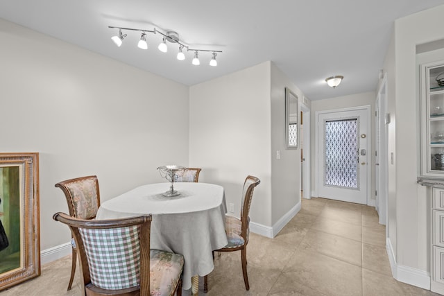 112 Piedmont C, Delray Beach, FL 33484 - dining area with baseboards and light tile patterned floors