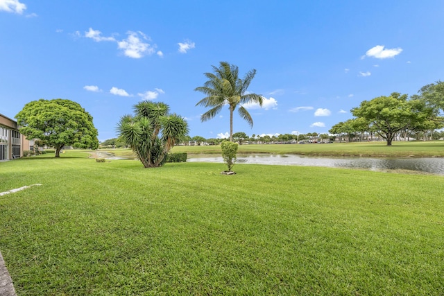112 Piedmont C, Delray Beach, FL 33484 - view of green lawn with a water view