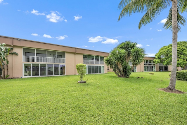 112 Piedmont C, Delray Beach, FL 33484 - view of green lawn