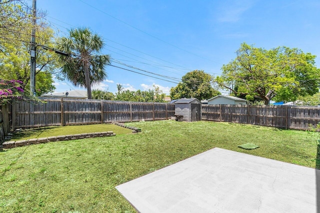 1405 N J Ter, Lake Worth Beach, FL 33460 - fenced backyard with a patio and a shed