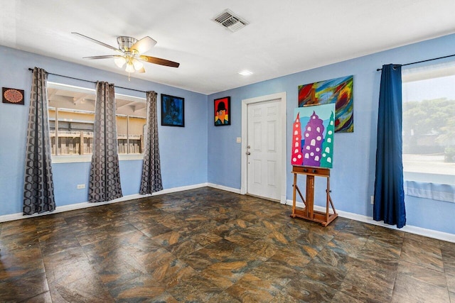 1405 N J Ter, Lake Worth Beach, FL 33460 - spare room featuring a ceiling fan and baseboards