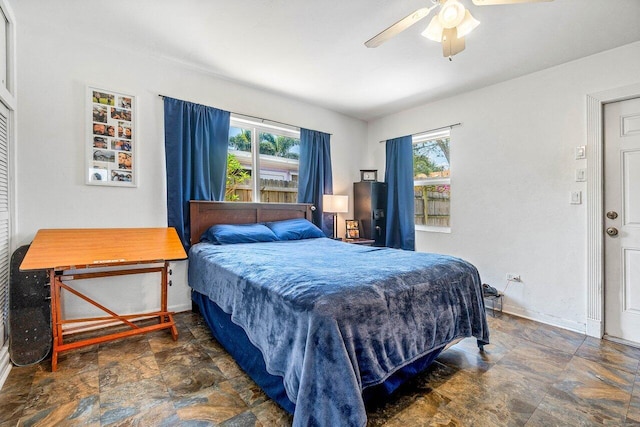 1405 N J Ter, Lake Worth Beach, FL 33460 - bedroom with stone finish floors and ceiling fan