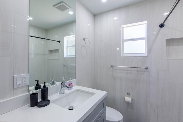 16932 W Aintree Dr W, Loxahatchee, FL 33470 - full bath featuring a tile shower, vanity, and toilet