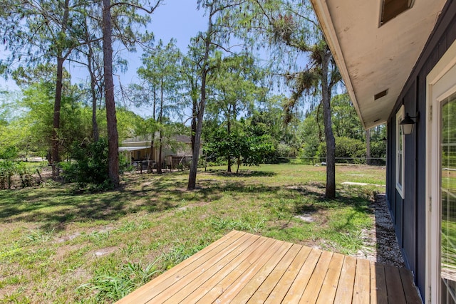16932 W Aintree Dr W, Loxahatchee, FL 33470 - deck with view of wooded area