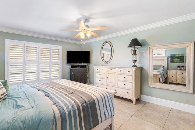 9950 Pyracantha Tree Ter Unit B, Boynton Beach, FL 33436 - bedroom with ornamental molding, light tile patterned flooring, baseboards, a ceiling fan, and multiple windows
