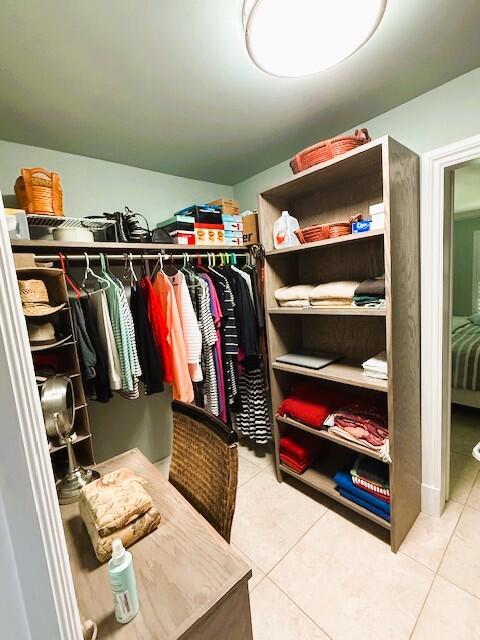 9950 Pyracantha Tree Ter Unit B, Boynton Beach, FL 33436 - spacious closet featuring tile patterned flooring