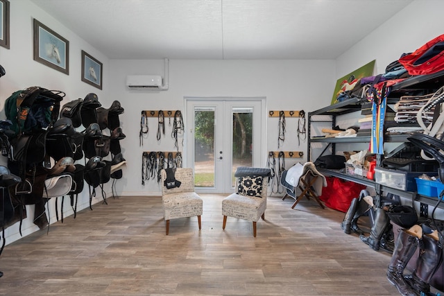 3442 C Rd, Loxahatchee Groves, FL 33470 - storage room featuring a wall mounted AC and french doors