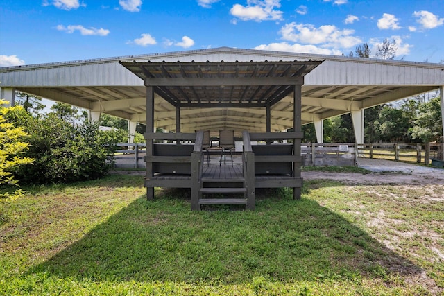 3442 C Rd, Loxahatchee Groves, FL 33470 - view of community featuring a carport and a wooden deck