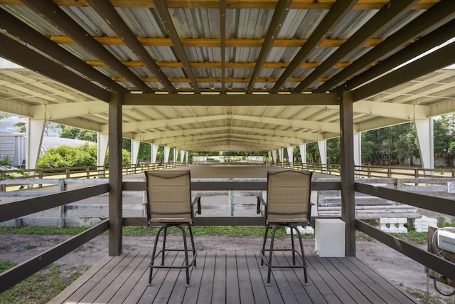 3442 C Rd, Loxahatchee Groves, FL 33470 - wooden terrace featuring a covered riding arena