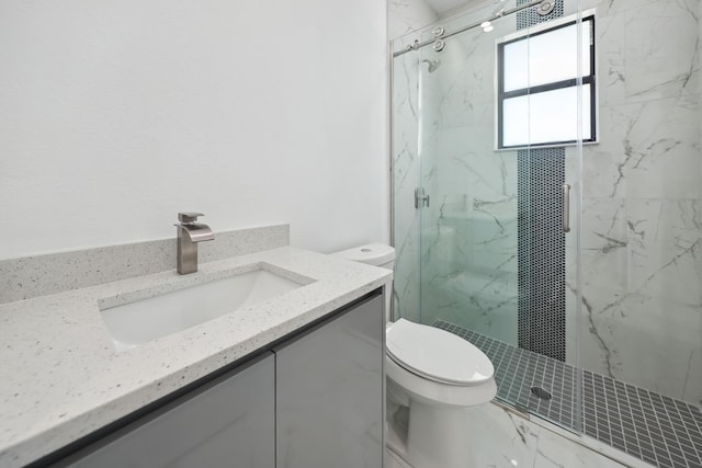 418 NE 31st Ter, Cape Coral, FL 33909 - full bathroom featuring toilet, a marble finish shower, and vanity