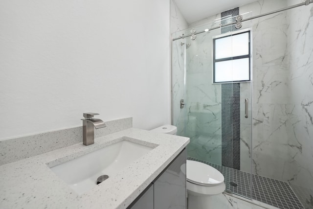418 NE 31st Ter, Cape Coral, FL 33909 - bathroom with toilet, a marble finish shower, vanity, and marble finish floors