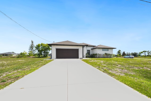418 NE 31st Ter, Cape Coral, FL 33909 - view of front of house featuring driveway, an attached garage, a front yard, and stucco siding