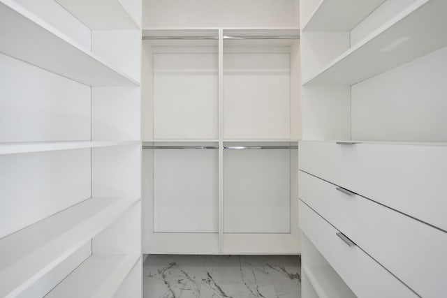 418 NE 31st Ter, Cape Coral, FL 33909 - walk in closet with marble finish flooring