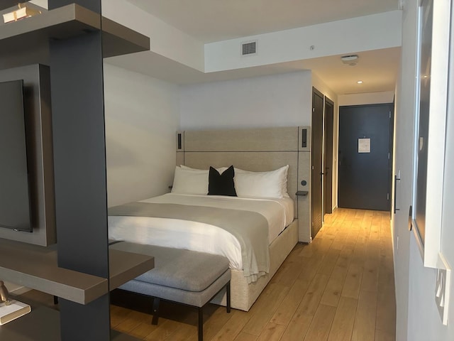 398 NE 5th St Unit 2503, Miami, FL 33132 - bedroom featuring light wood-type flooring